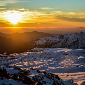 fotografía de atardecer en valle las trancas nevado